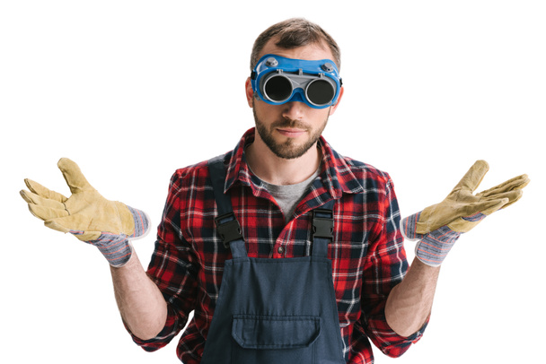 ouvrier en lunettes et gants de soudage
 - Photo, image