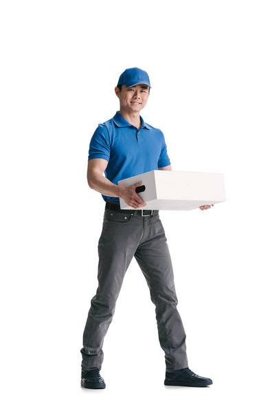 young asian courier with blank box - Photo, Image