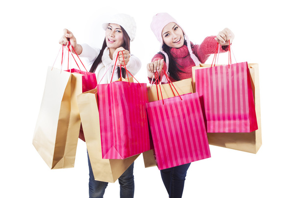 Winter shopping with bags isolated in white - Foto, imagen