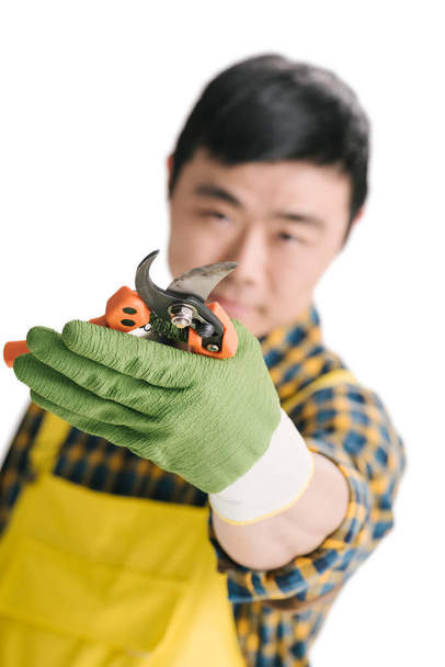 handsome asian gardener with secateurs - Photo, Image