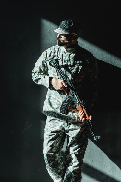 soldier in military uniform with rifle - Valokuva, kuva