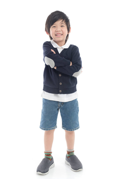 Portrait of cute Asian child in cardigan on white background isolated - Foto, Imagem