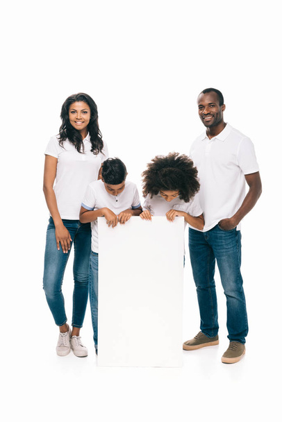 happy african american family with banner - Fotó, kép