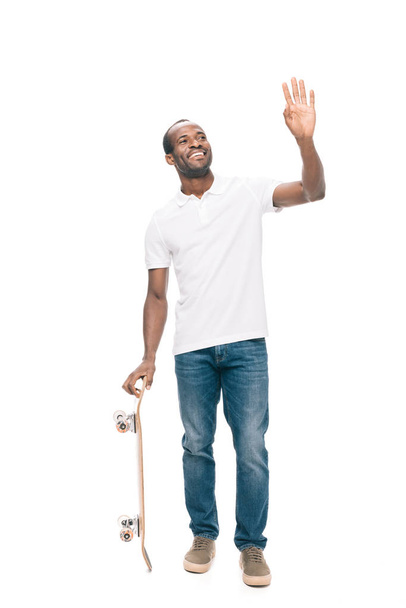 african american man with skateboard - Foto, immagini