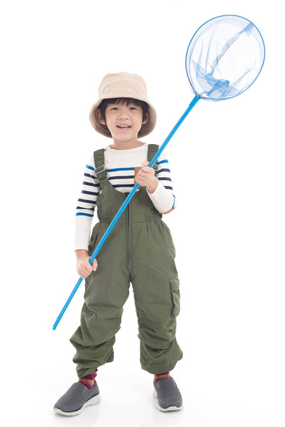 Cute Asian child holding catching net on white background isolated - Photo, image