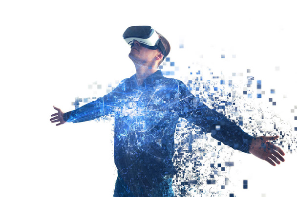 A person in virtual glasses flies to pixels. The man with glasses of virtual reality. Future technology concept. Modern imaging technology. - Photo, Image