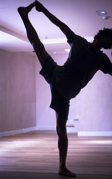 Man yoga stretching splits - Photo, Image
