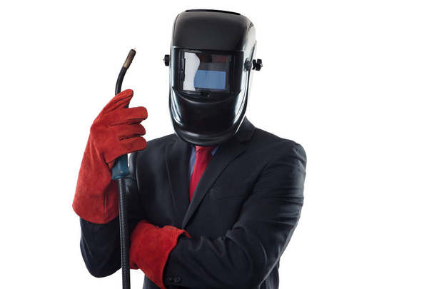 επιχείρηση άνθρωπος φορώντας μια μάσκα συγκόλλησης - Φωτογραφία, εικόνα