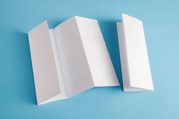 template fold white paper on blue background - Foto, immagini