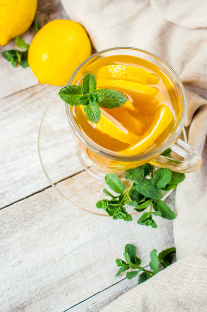 Tea with mint and lemon. Selective focus. - Photo, image