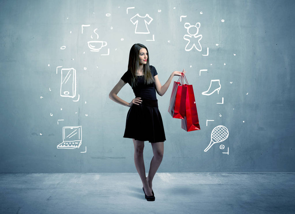 Shopping vrouw met tassen en getekende pictogrammen - Foto, afbeelding