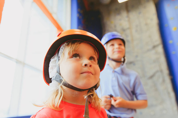 little girl and boy learn sport climbing - Foto, Imagen