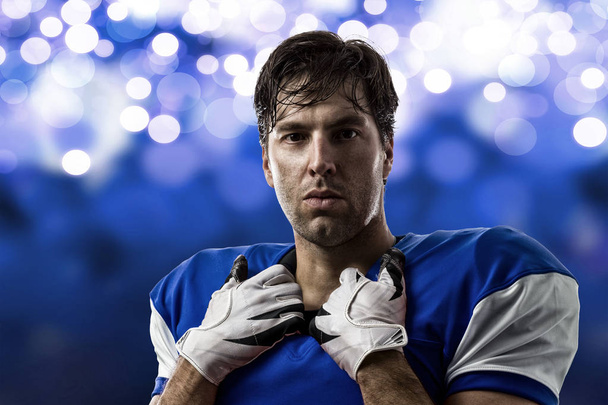 Football Player with a blue uniform - Foto, imagen