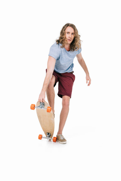 handsome young man with skateboard - Foto, Imagem