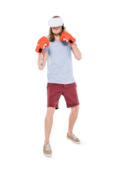 man boxing in virtual reality headset  - 写真・画像