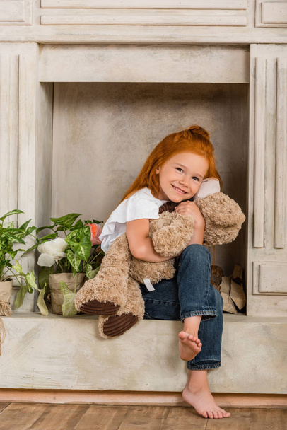 adorable little girl with teddy bear - Fotografie, Obrázek