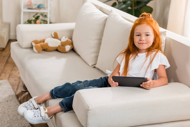 little girl with tablet at home - Foto, Imagem