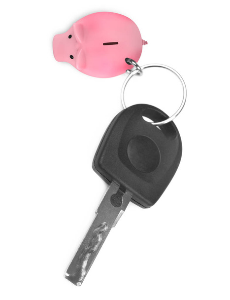 Автомобільний ключ зі свинячим банком дрібничка
 - Фото, зображення