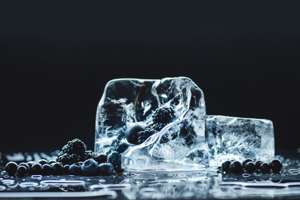frozen fruits in ice cubes - 写真・画像