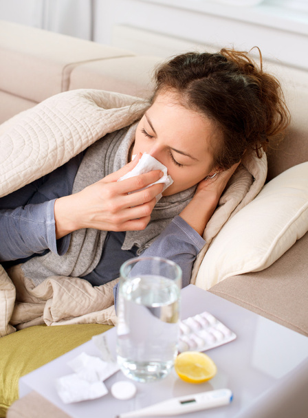 Sick Woman. Flu. Woman Caught Cold. Sneezing into Tissue - Valokuva, kuva