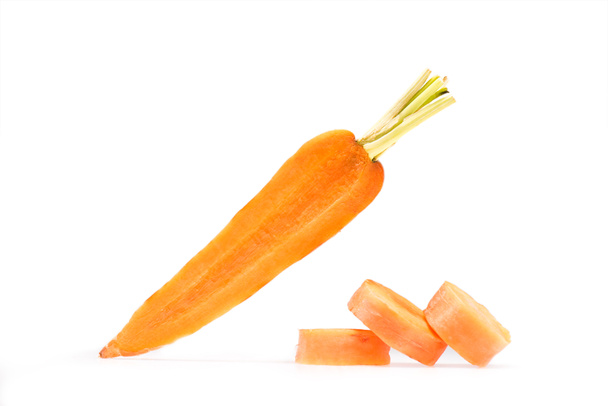 fresh ripe carrot with stack of slices - Photo, Image