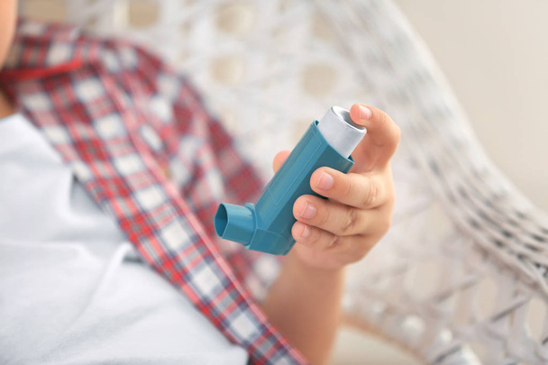 Boy with inhaler for asthma, closeup - Фото, зображення