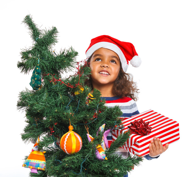 Little girl in Santa's hat with gift box - Foto, Imagem