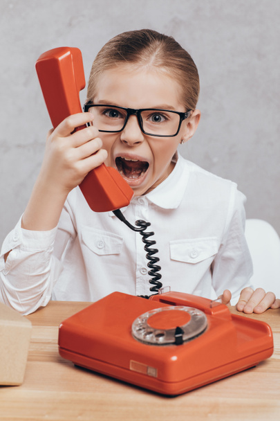 screaming child with telephone - Photo, Image