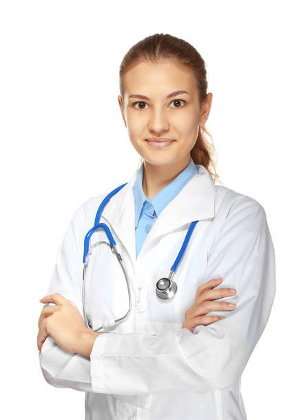Young female doctor with stethoscope on white background - Fotografie, Obrázek