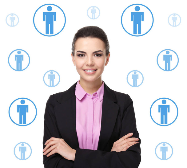 Jeune femme d'affaires et les employés icônes sur fond blanc. Concept de gestion des ressources humaines
 - Photo, image