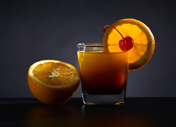 Orange juice and cherry. - Fotoğraf, Görsel