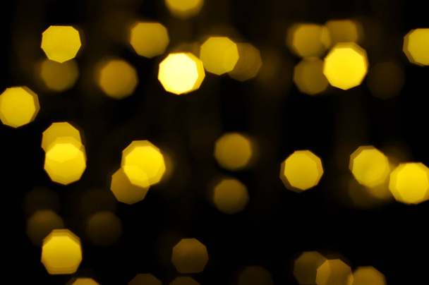 Defocused bokeh lights in blur night background - Valokuva, kuva