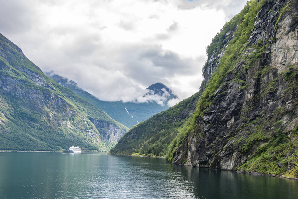 Cloudy weather at Geiranger fjord - Фото, изображение