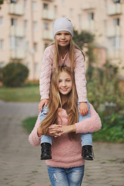 two beautiful girls on the street - Fotografie, Obrázek