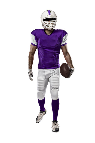 Football Player with a purple uniform - Фото, зображення