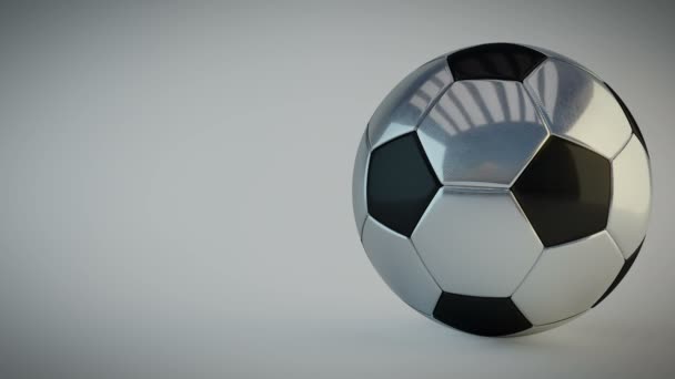 Вращающийся глянцевый футбольный мяч на белом фоне - бесшовный цикл
 - Кадры, видео
