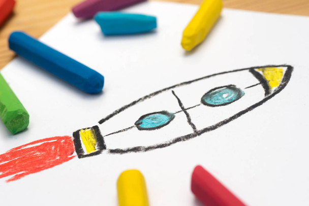 child drawing, rocket , selective focus  - Фото, изображение