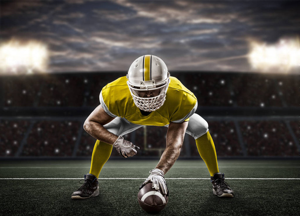 Football Player with a yellow uniform - Photo, Image