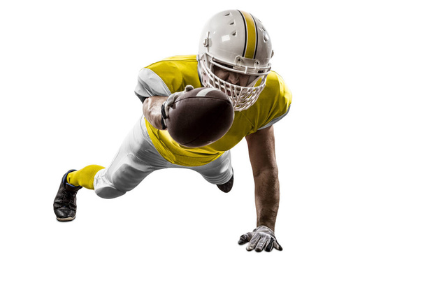 Football Player with a yellow uniform - Foto, Imagen