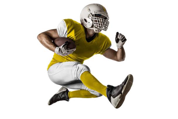 Football Player with a yellow uniform - Фото, изображение