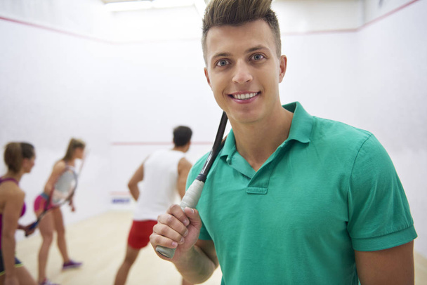 man holding squash racket - Photo, Image