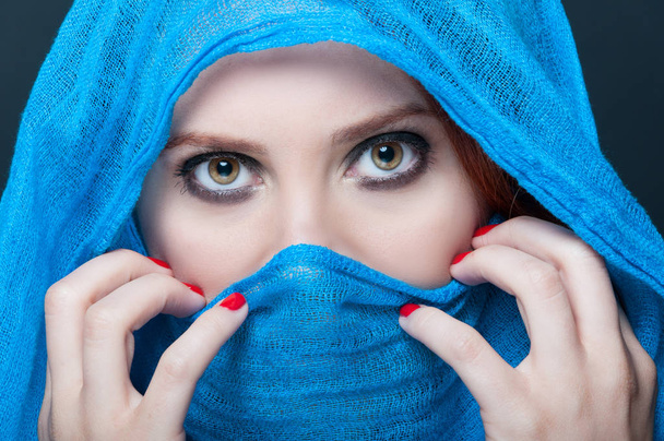 Female with blue burka looking mysterious - Photo, Image
