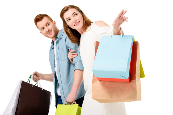 couple holding shopping bags - 写真・画像
