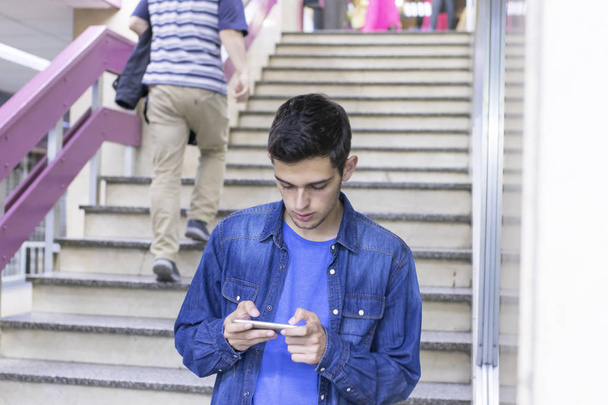 teenager with the mobile - Photo, Image