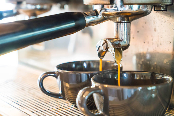 Professional coffee machine making espresso in a cafe - Foto, immagini