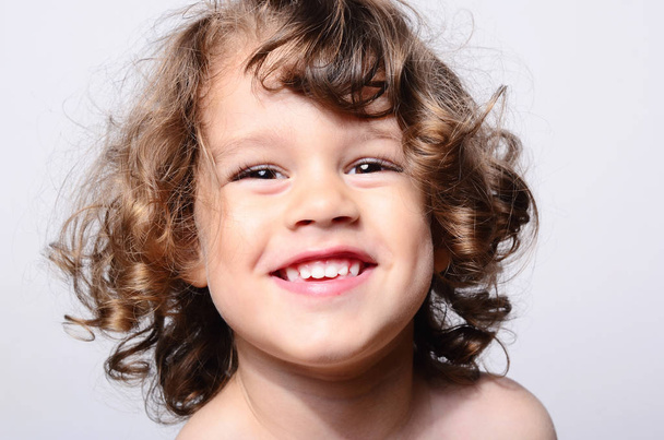 Portrait of a happy beautiful boy. Toddler smiling and having fun.  - Zdjęcie, obraz