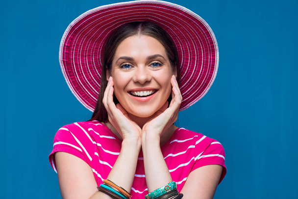 Happy woman close up portrait with pink beach hat  - Φωτογραφία, εικόνα