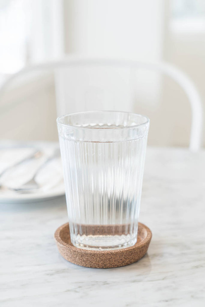 glass of water on dinning table - Zdjęcie, obraz