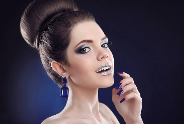 Makeup and manicure. Beauty portrait of young adorable looking b - Foto, afbeelding