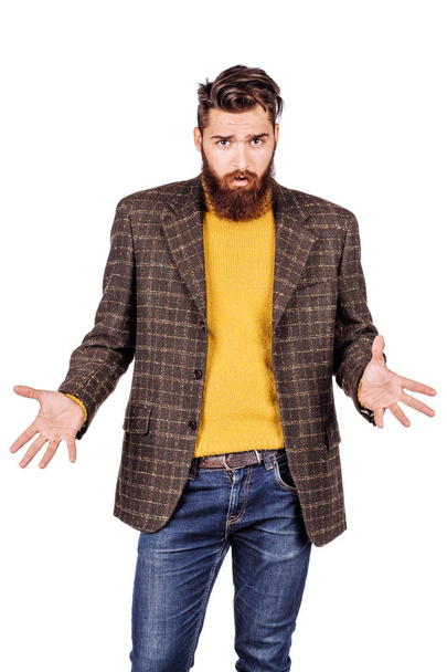 portrait of bearded business man with confused. emotions, facial expressions, feelings, body language, signs. image on a white studio background. - Photo, image